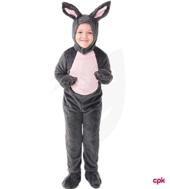 Little child smiling while wearing white and pink rabbit costumes for kids with long ears.